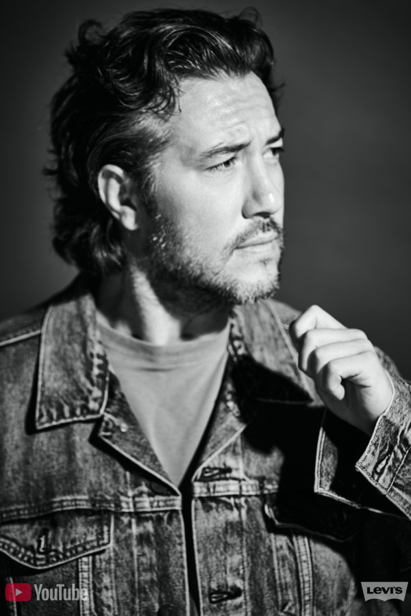 Max in a denim jacket, black and white editorial portrait