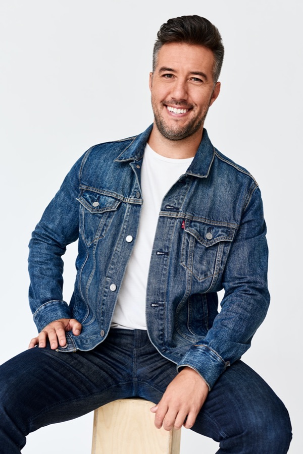 Max in Levi's denim jacket and jeans